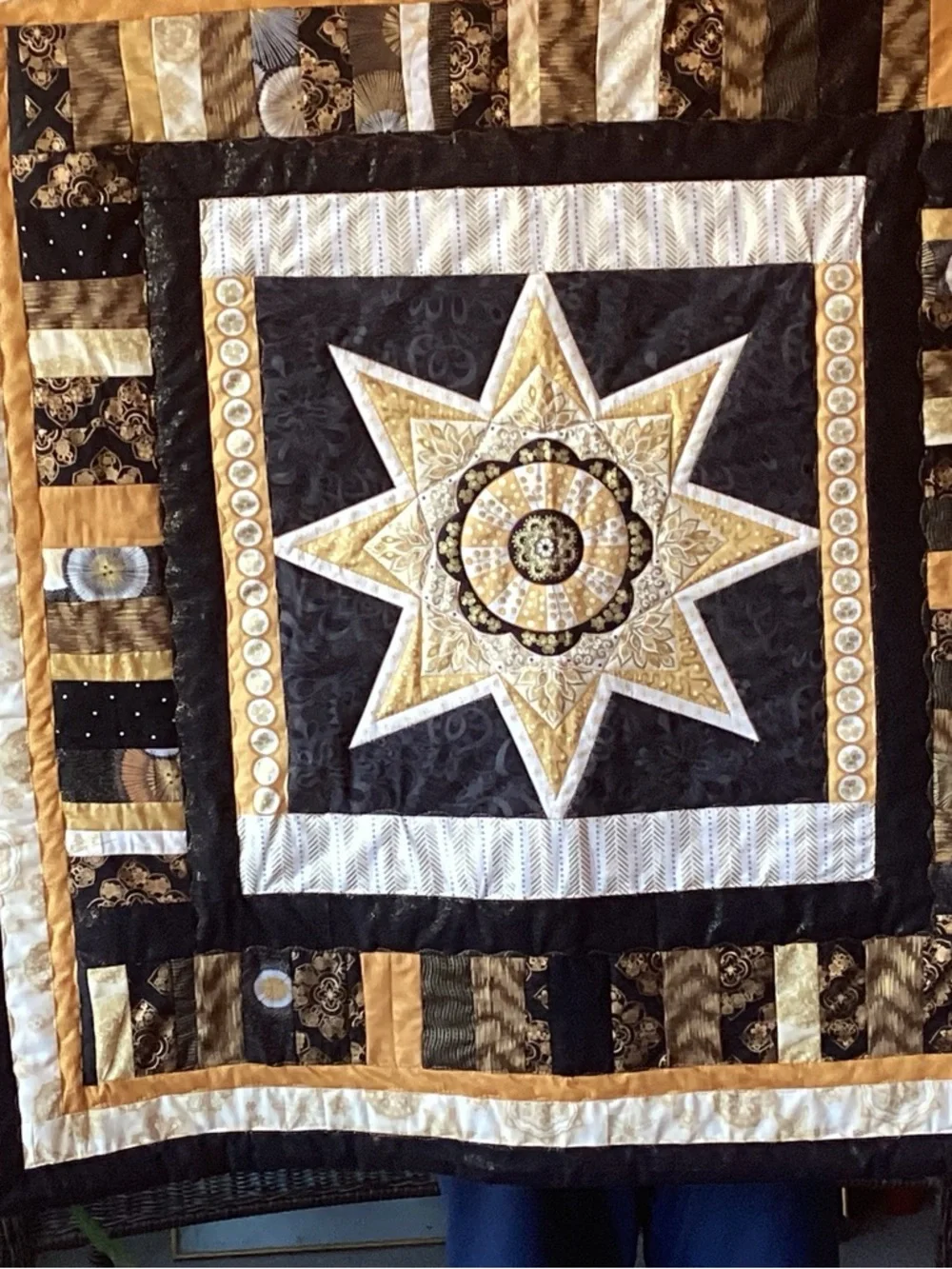 NWT. Gold and Black Star Lap Quilt